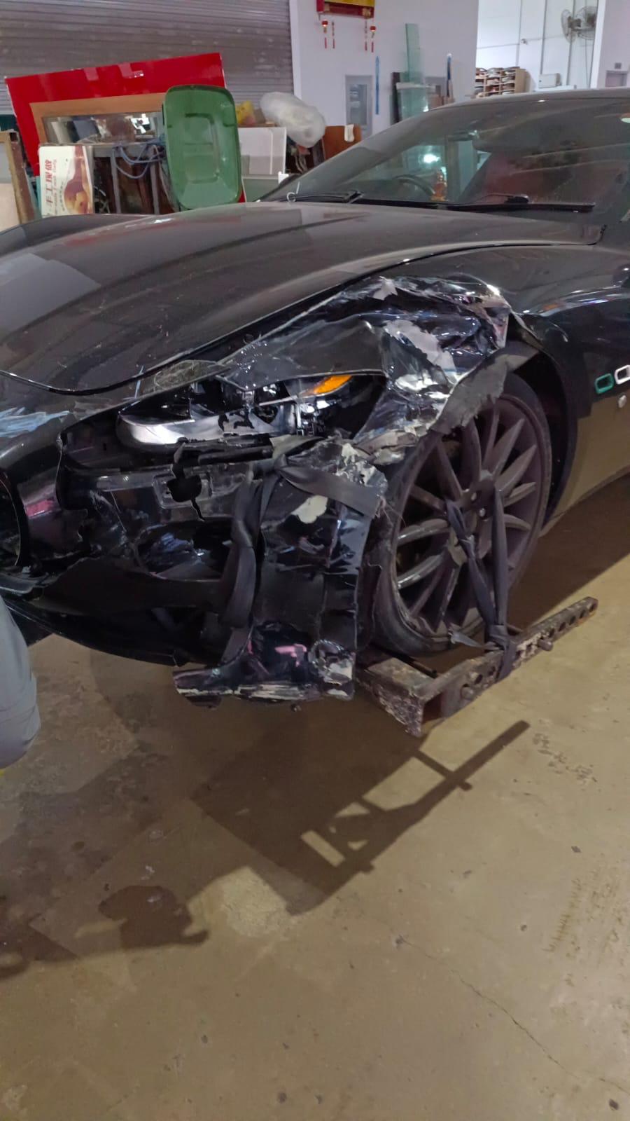 Accident damage assessment documented at JW Motoring Kaki Bukit, Singapore