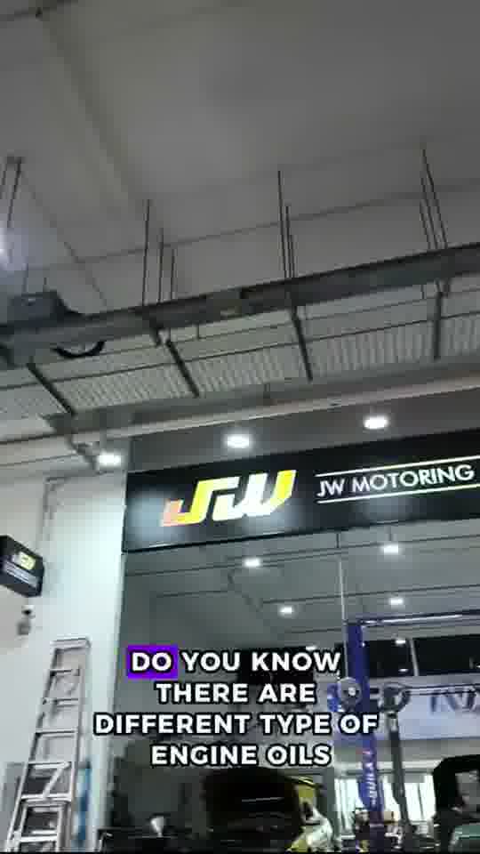 Car servicing and maintenance video at JW Motoring Kaki Bukit, Singapore — real workshop bays, lifts, and manufacturer-spec care