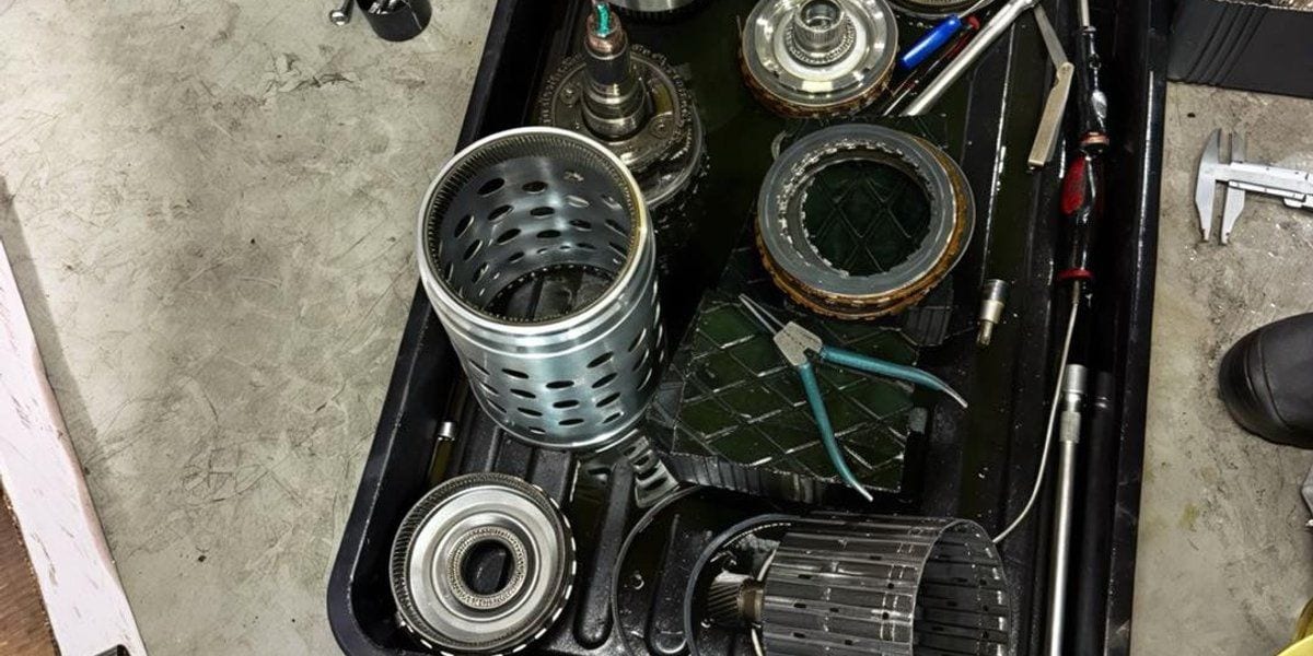Electrical and module-adjacent hardware work at JW Motoring, Singapore workshop